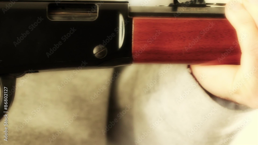 dolly shot of lever action rifle