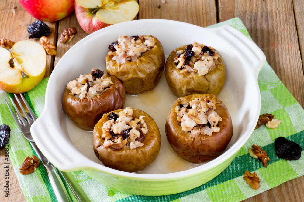 Delicious baked apple filled with minced meat, prunes, onions and walnuts