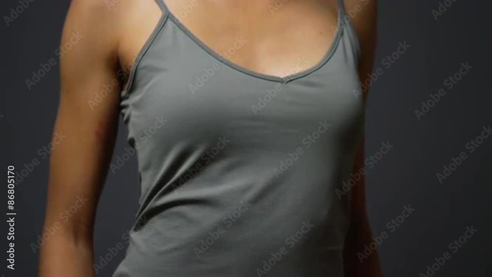 Slow pan up African woman laughing and smiling Slow pan up African woman laughing and smiling