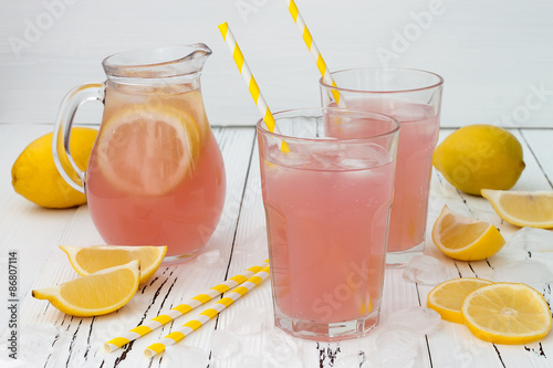 Detox fruit infused flavored water with cherry, lemon and mint. Refreshing summer homemade cocktail. Clean eating