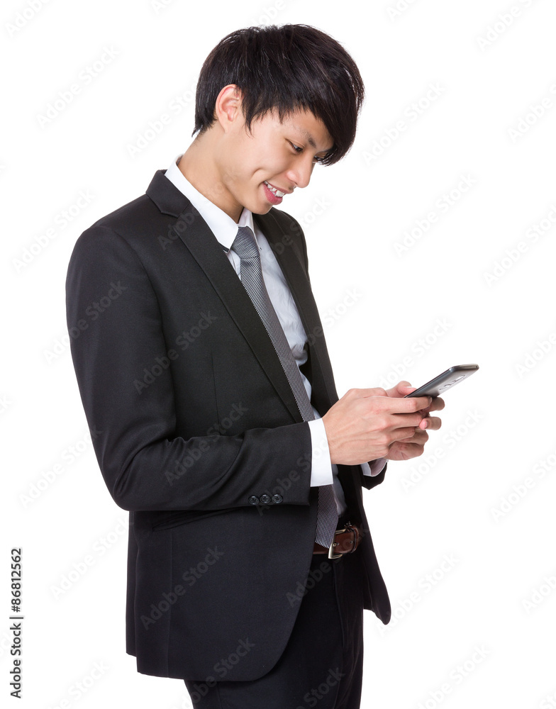 Young Businessman use of the cellphone Young Businessman use of the cellphone