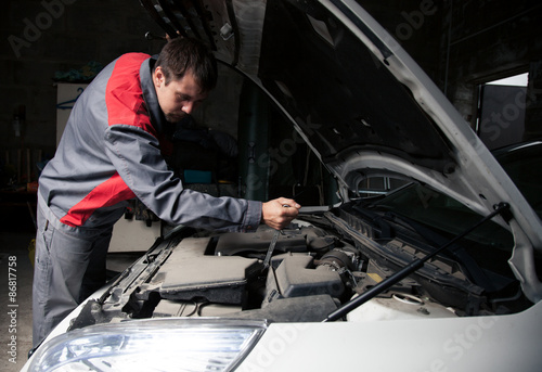 Car mechanic. Auto repair service.