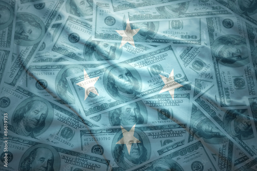 colorful waving united States of Micronesia flag on a american dollar money background