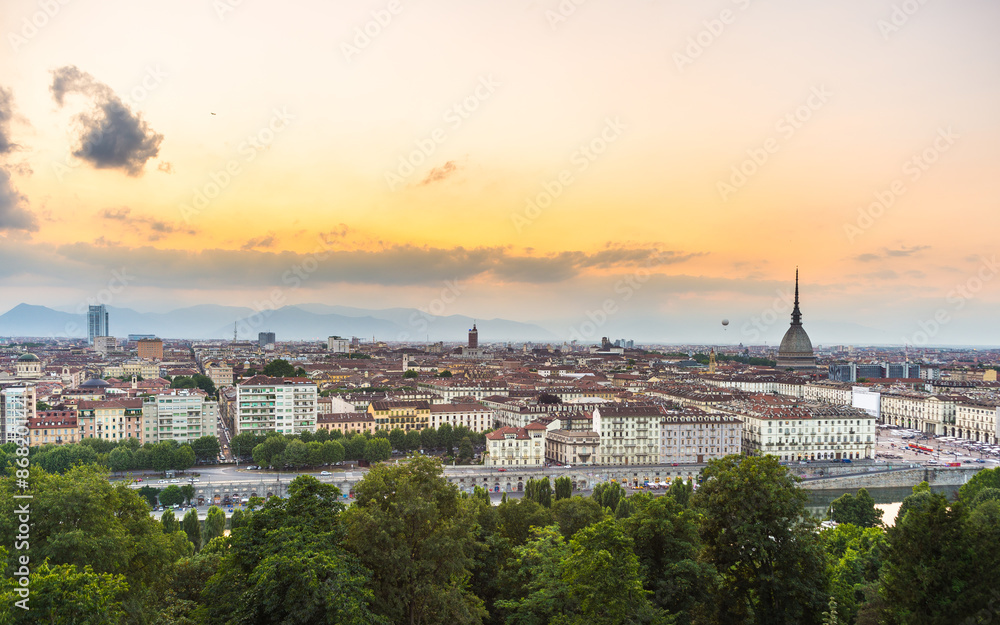 Panoramic cityscape of Turin from above at sunset