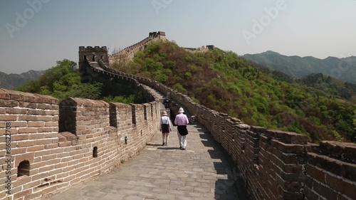 tourists on a beautiful section of great wall of china beijing mutianyu