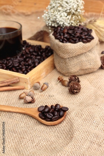 Roasted coffee beans with hot coffee