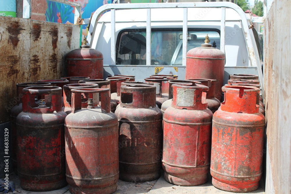 Old red gas cylinders.
High pressure propane or LPG gas cylinders. Old red gas cylinders.
High pressure propane or LPG gas cylinders.