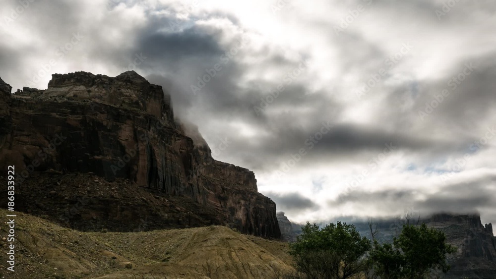 desert buttes and clouds in morning timelapse desert buttes and clouds in morning timelapse
