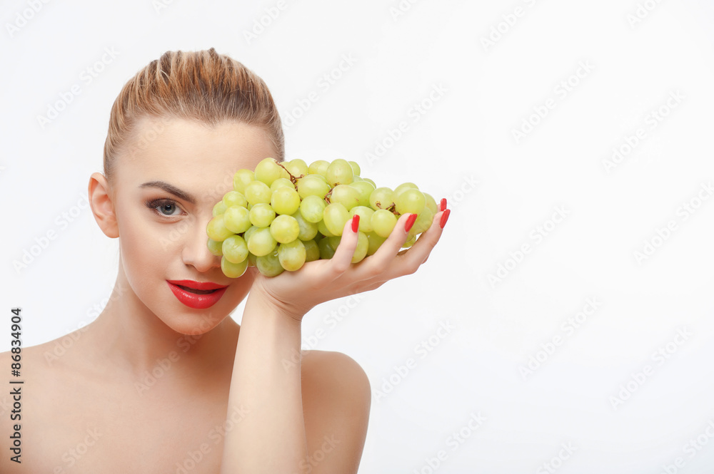 Attractive young woman with green fresh grape Attractive young woman with green fresh grape