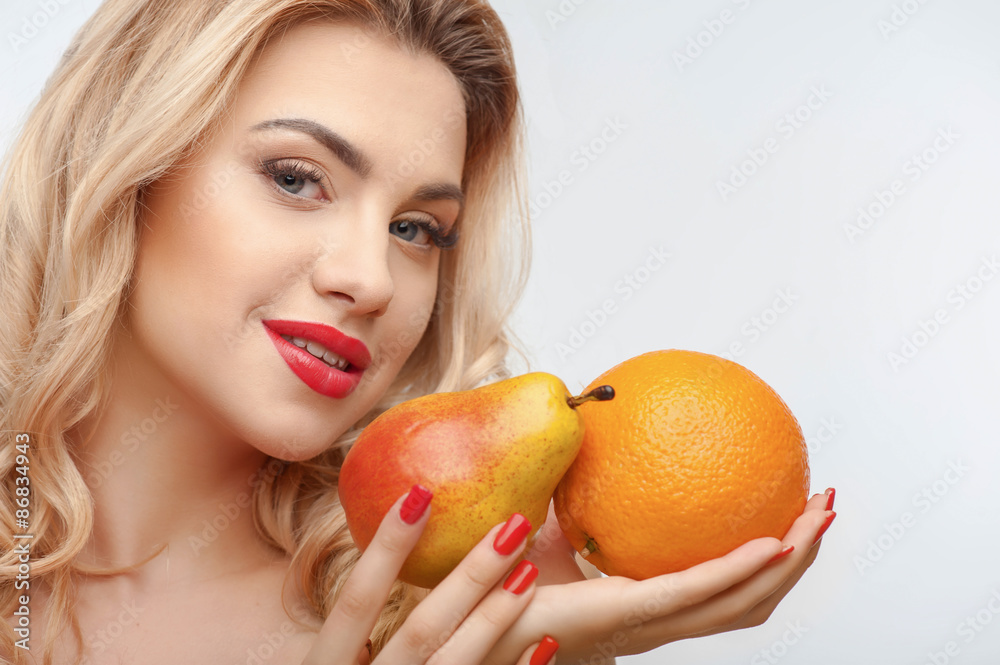 Attractive young girl with two tasty fruits Attractive young girl with two tasty fruits