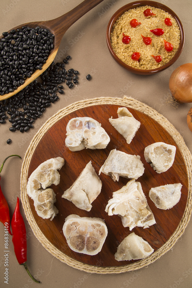 Foot raw pork on wooden background Foot raw pork on wooden background