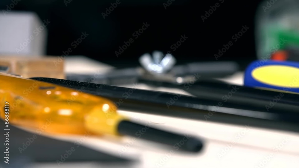 Low angle close up panning of workshop tools Low angle close up panning of workshop tools