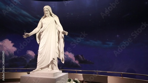 people look at the christus statue at salt lake city temple square