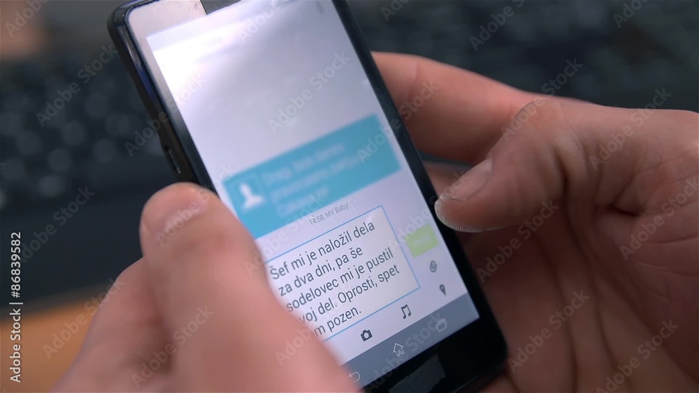 Close Up Sending Text Message on Mobile Phone Close Up Sending Text Message on Mobile Phone