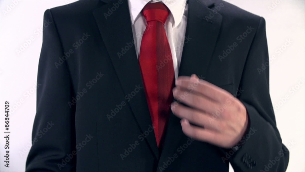Man In Suit Placing Mobile Phone in Inside Pocket Man In Suit Placing Mobile Phone in Inside Pocket