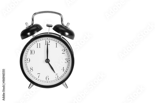 Five O' Clock on alarm clock isolated on white
