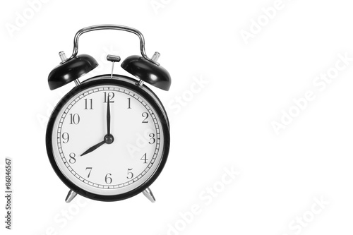 Eight O' Clock on alarm clock isolated on white