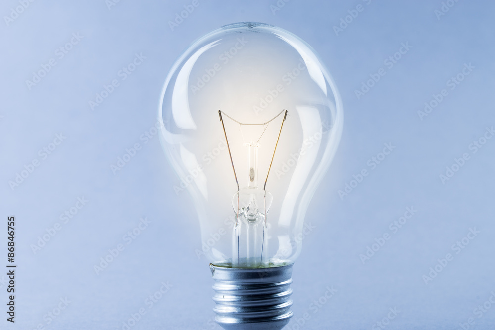 Glowing yellow light bulb, busienss idea concept Glowing yellow light bulb, busienss idea concept