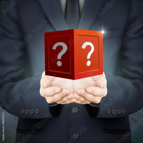businessman holding mysterious box