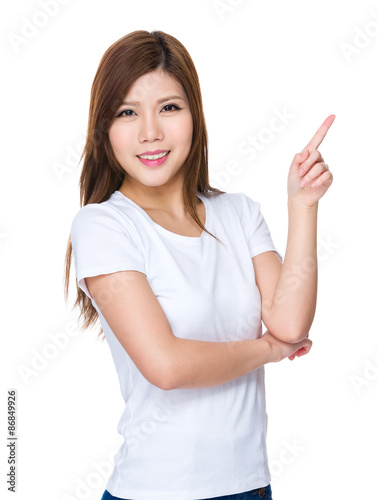 Young woman showing finger point up