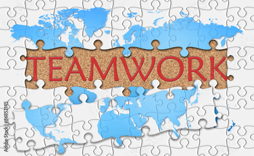 Jigsaw puzzle reveal word teamwork