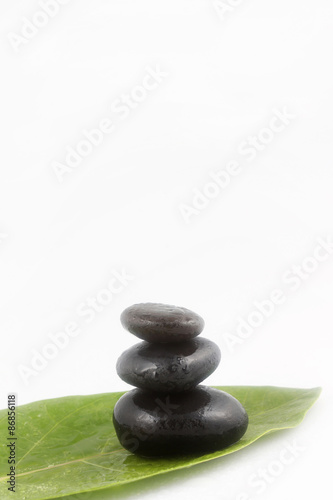 Fototapeta Naklejka Na Ścianę i Meble -  Balanced black zen stones on white background

