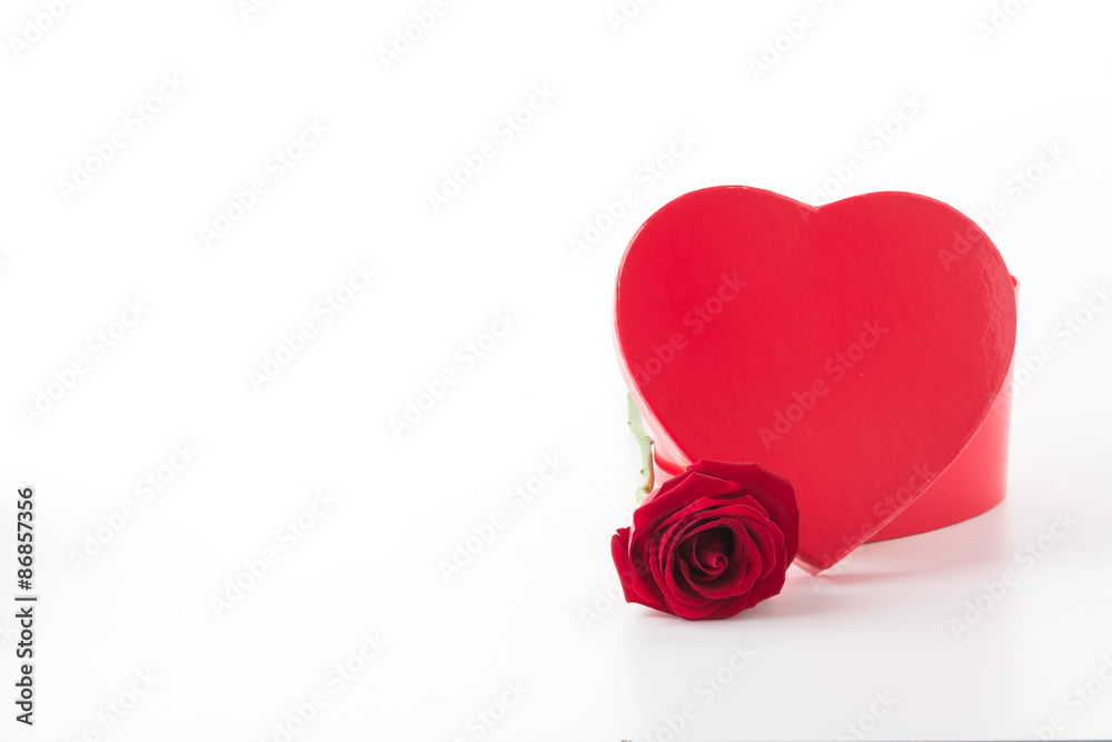 red rose with red heart box