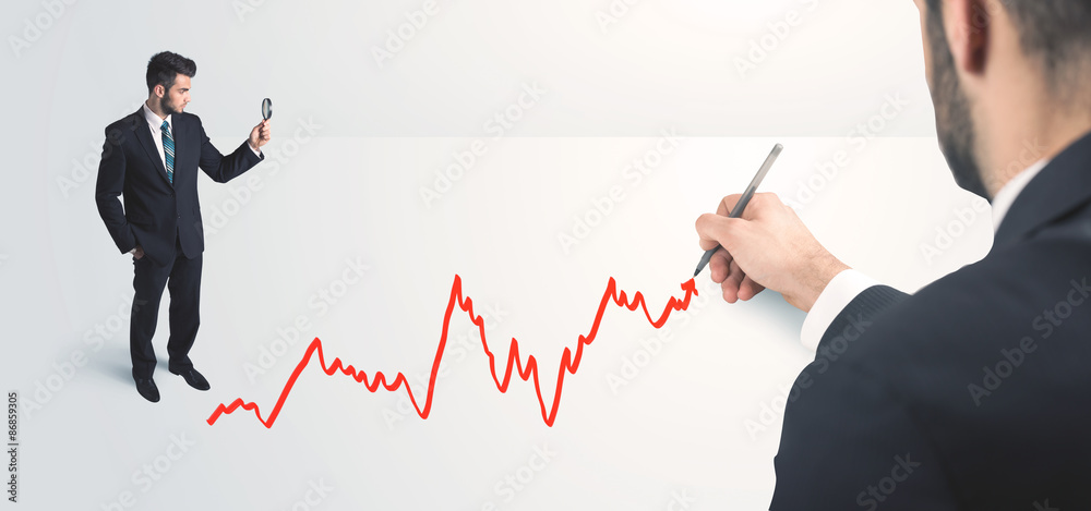 Business person looking at line drawn by hand Business person looking at line drawn by hand