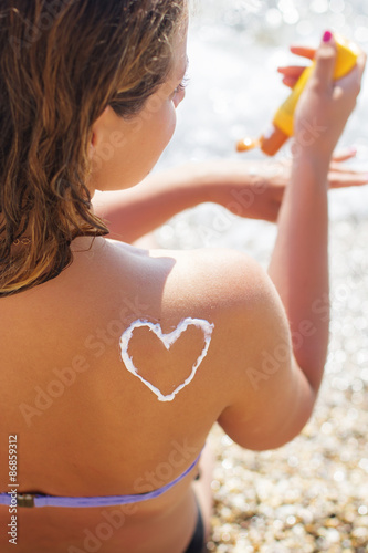 Closeup picture of sunscreen spf filtred tan lotion  photo