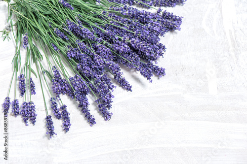 Fototapeta Naklejka Na Ścianę i Meble -  Lavender flowers over rustic wooden background