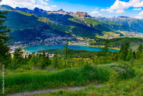 View of St. Moritz from a mountain trail in summer photo