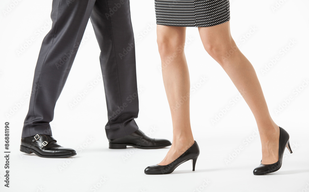 Unrecognizable business people going off in contrary directions Unrecognizable business people going off in contrary directions
