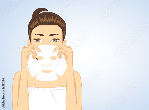 Beautiful woman holding facial sheet mask hide half face. beauty concept