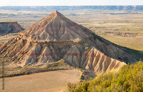 Hill at semi-desert landscape of bardenas reales natural park photo