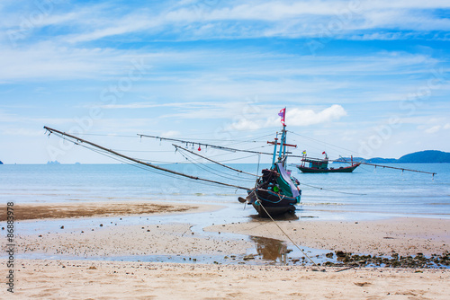 sea and fishing boat blue sky background