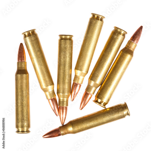 Rifle bullets on a white background.