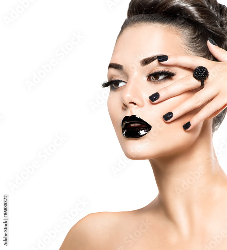 Fotografie Beauty model girl with black make up and long lushes