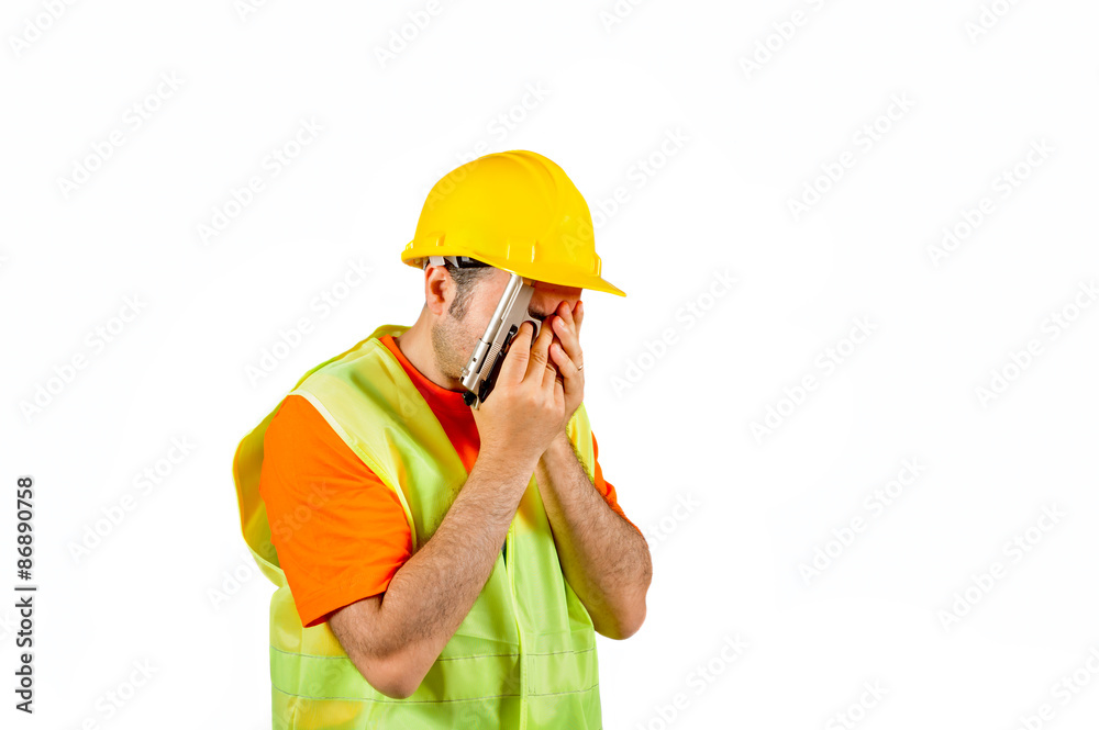 failure sadness guilty manuel worker regretful gun in hand isolated on white portrait failure sadness guilty manuel worker regretful gun in hand isolated on white portrait