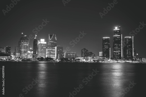 Detroit at Night Black and White. Downtown Detroit  Michigan as seen from across the Detroit river in Windsor  Canada. Shot late at night and carefully edited in black and white.