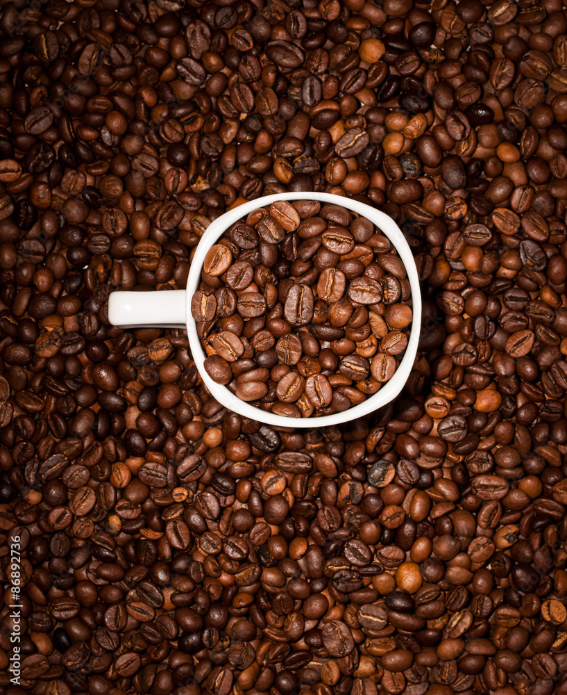 Fototapeta premium cup full of coffee beans