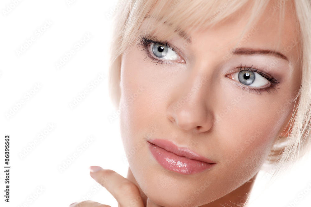 Close up portrait of beautiful young woman face. Isolated on