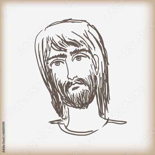 The man's head with a beard.