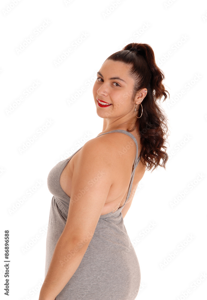 Beautiful woman in gray dress in profile. Beautiful woman in gray dress in profile.