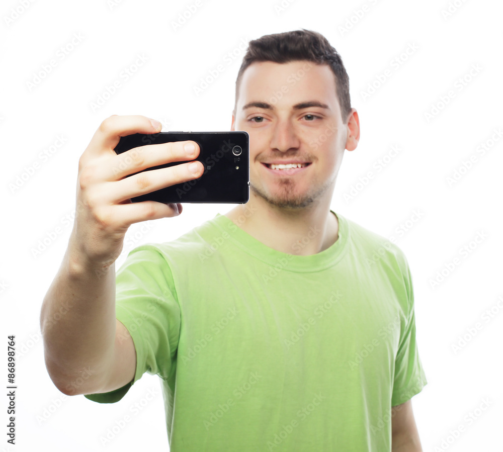 young man making photo of himself young man making photo of himself