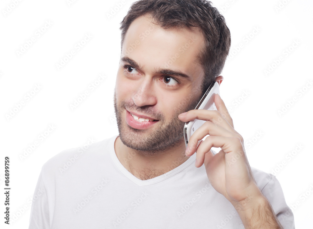  man in shirt speaking on the phone