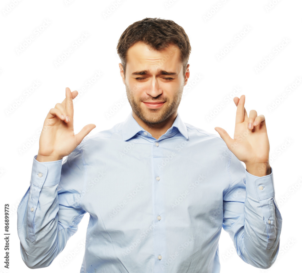 business man in shirt keeping fingers crossed business man in shirt keeping fingers crossed