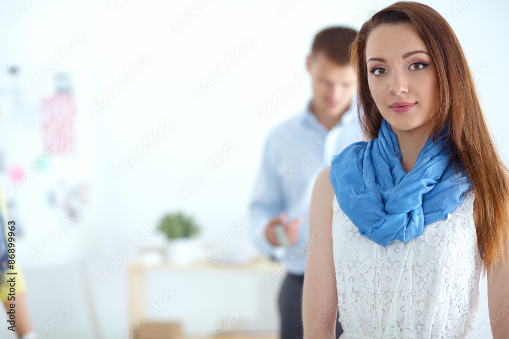 Portrait of attractive female designer in office Portrait of attractive female designer in office