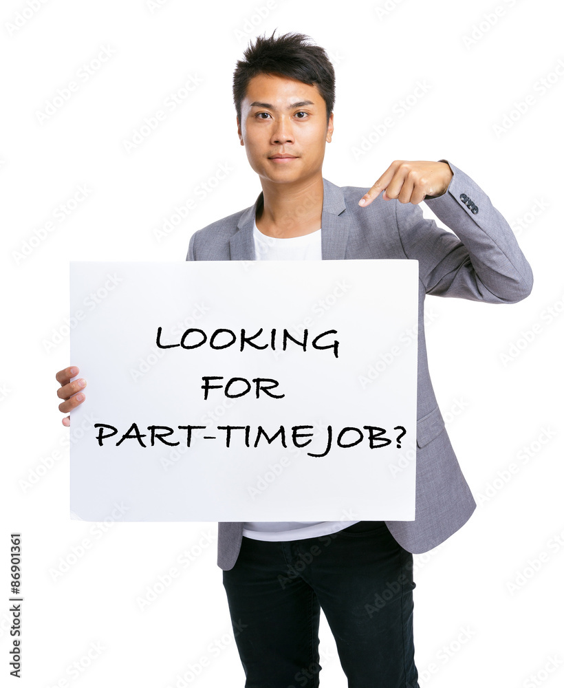 Business man finger pointing to placard showing phrase of lookin Business man finger pointing to placard showing phrase of lookin
