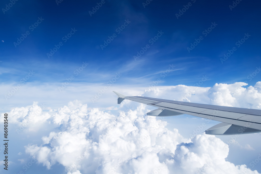 airplane wing on the clouds sea airplane wing on the clouds sea