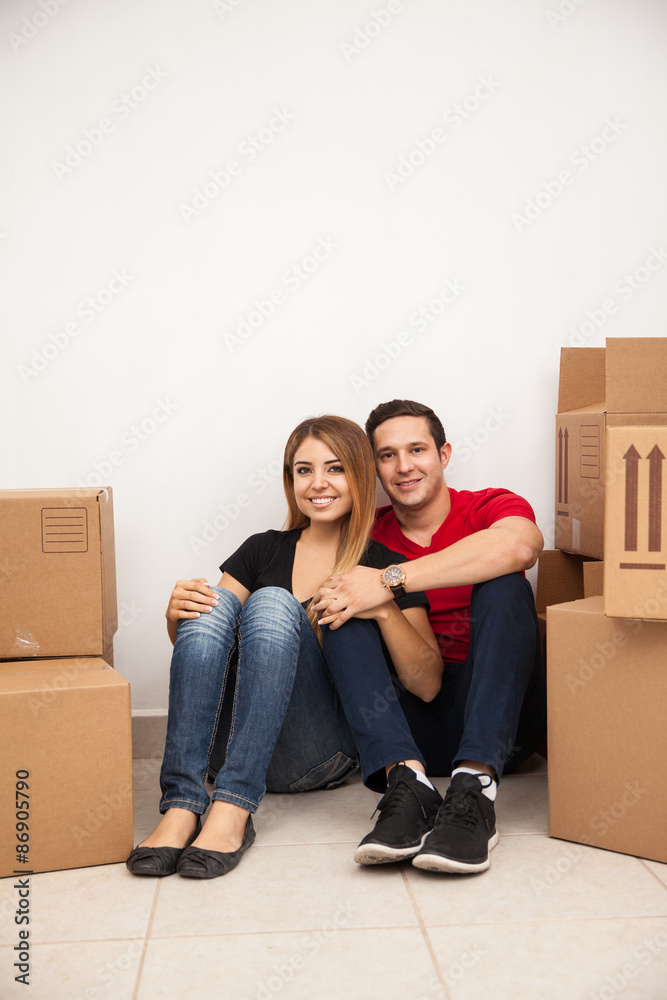 Happy couple moving in together Happy couple moving in together